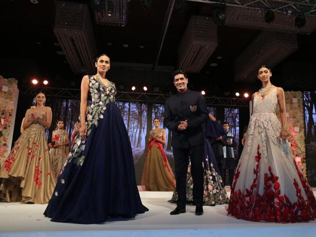 Designer Manish Malhotra takes a bow post his show. 