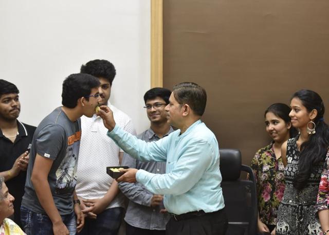 Students of Ruia collage was congratulated by collage principal Uday Salunkhe at Dadar in Mumbai on Wednesday, May 25, 2016. (Kunal Patil)