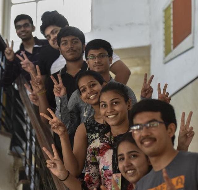 Topers of of Ruia collage poses for picture after HSC result was declare at Ruia collage campus at Dadar in Mumbai on Wednesday, May 25, 2016. (Kunal Patil)