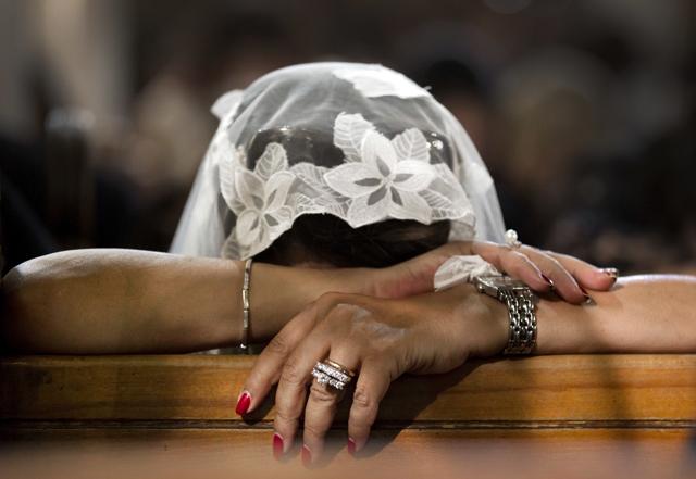 In this Sunday, May 22, 2016 photo, a Coptic Christian grieves during prayers for the departed, remembering the victims of Thursday's crash of EgyptAir flight 804. (AP) In this Sunday, May 22, 2016 photo, a Coptic Christian grieves during prayers for the departed, remembering the victims of Thursday's crash of EgyptAir flight 804. (AP)