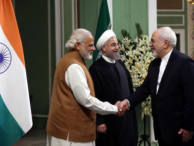 Iran's foreign minister, Mohammad Javad Zarif (R), shakes hands with Indian Prime Minister Narendra Modi as he stands next to Iran's President Hassan Rouhani in Tehran. (REUTERS File) Iran's foreign minister, Mohammad Javad Zarif (R), shakes hands with Indian Prime Minister Narendra Modi as he stands next to Iran's President Hassan Rouhani in Tehran. (REUTERS File)