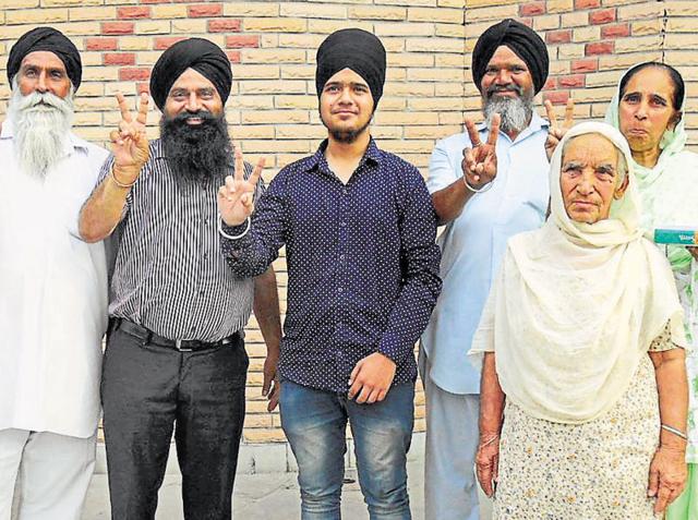 Sukhkaran Singh with his family members in a jubilant mood at SBS Nagar on Tuesday. (HT Photo) Sukhkaran Singh with his family members in a jubilant mood at SBS Nagar on Tuesday. (HT Photo)