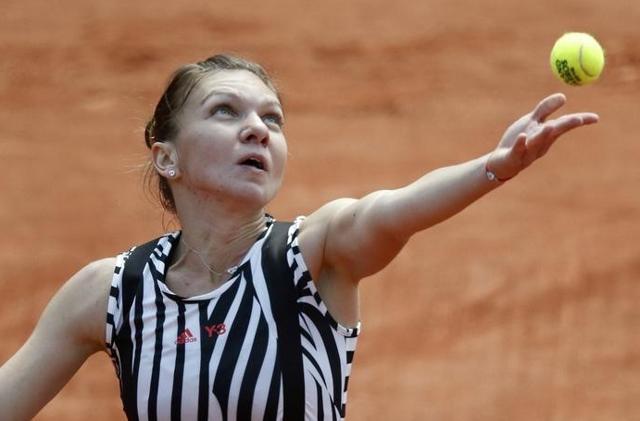 Simona Halep of Romania serves against Kazakhstan's Zarina Diyas in the 2016 French Open. (Reuters Photo) Simona Halep of Romania serves against Kazakhstan's Zarina Diyas in the 2016 French Open. (Reuters Photo)