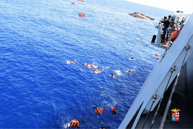 This handout picture shows the shipwreck of the overcrowded boat of migrants off the Libyan coast. (AFP Photo) This handout picture shows the shipwreck of the overcrowded boat of migrants off the Libyan coast. (AFP Photo)