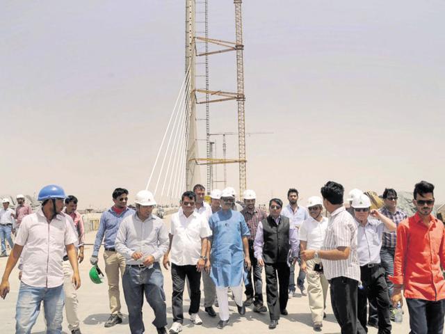 Kota MP Om Birla and NHAI officials inspect the bridge construction in Kota on Wednesday. (HT Photo/AH Zaidi) Kota MP Om Birla and NHAI officials inspect the bridge construction in Kota on Wednesday. (HT Photo/AH Zaidi)