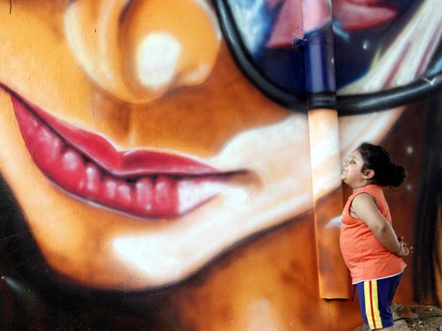 Aiming to make Ludhiana the ‘graffiti capital’ of India, students, artists and NGOs , with the local municipal corporation’s backing, have formed groups to paint pillars, walls and trees in different parts of the city. (JS Grewal/HT Photo)