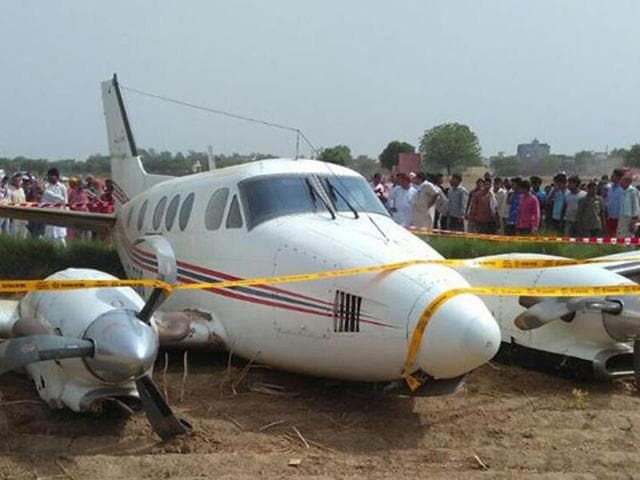 The pilot opened the doors and all the passengers, except Juhi and his stretcher-ridden father, started crawling out. (HT Photo) The pilot opened the doors and all the passengers, except Juhi and his stretcher-ridden father, started crawling out. (HT Photo)