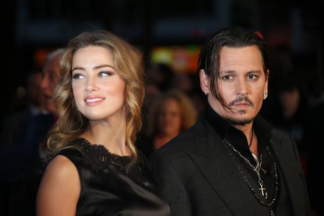 Amber Heard and Johnny Depp have been married for 15 months. (AP) Amber Heard and Johnny Depp have been married for 15 months. (AP)
