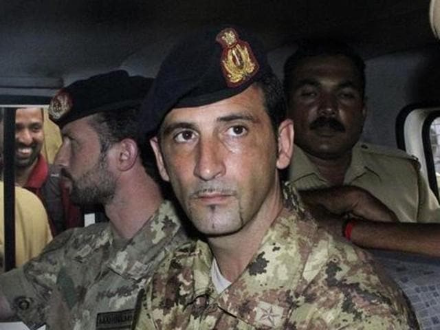 File photo of Salvatore Girone in a police vehicle after appearing before a court in Kerala. (Reuters File Photo) File photo of Salvatore Girone in a police vehicle after appearing before a court in Kerala. (Reuters File Photo)