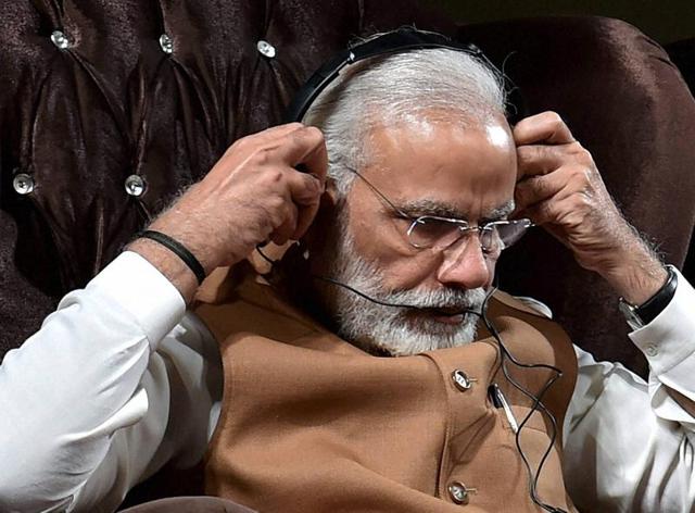 Prime Minister Narendra Modi listens to a manuscript “Kalileh wa Dimneh" an old translation into Persian of Panchatantra and Jataka at Vahadat hall in Tehran.(PTi) Prime Minister Narendra Modi listens to a manuscript “Kalileh wa Dimneh" an old translation into Persian of Panchatantra and Jataka at Vahadat hall in Tehran.(PTi)