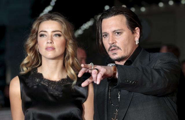 Johnny Depp and Amber Heard arrive for the premiere of the British film Black Mass in London. (REUTERS) Johnny Depp and Amber Heard arrive for the premiere of the British film Black Mass in London. (REUTERS)