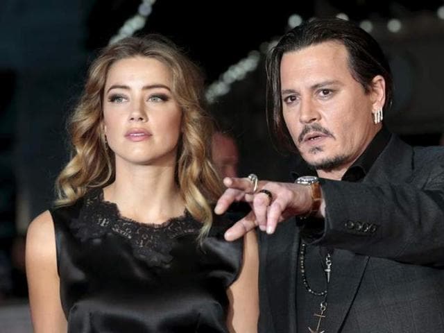 In this Jan. 2, 2016 file photo, Amber Heard, left, and Johnny Depp arrive at the 27th annual Palm Springs International Film Festival Awards Gala in Palm Springs, Calif.(AP)