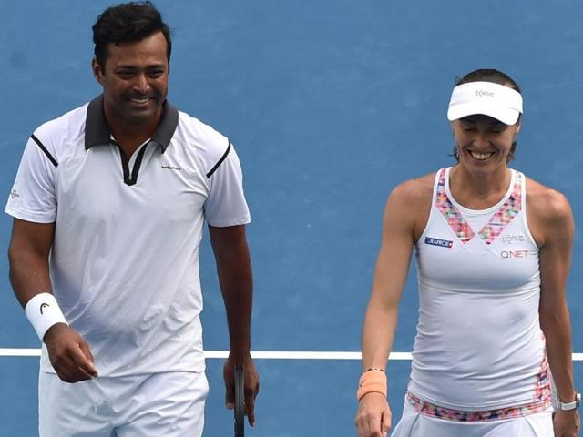 Paes and Hingis, winners of three Grand Slam titles last season, won 6-4, 6-4 against Anna-Lena Groenefeld and Robert Farah. (AFP) Paes and Hingis, winners of three Grand Slam titles last season, won 6-4, 6-4 against Anna-Lena Groenefeld and Robert Farah. (AFP)