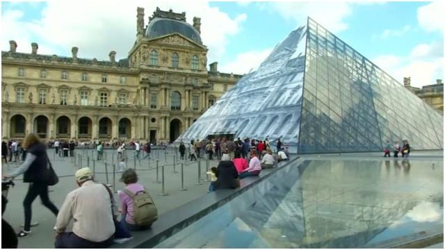 <p>It's not magic -- but the glass pyramids in front of the Louvre are gone -- temporarily. French artist JR made over the pyramids -- hiding them behind a huge black and white pointillist picture of the museum's facade.&rdquo;It was the only way to really make it disappear, by playing with the architecture, from one point of view making it completely disappear from view like a magician but then also making it look different from other points of view. So people are taking photos as we're talking to each other and depending on where they stand they have totally different photo.&rdquo;JR's unique public art works have been displayed from the Middle East to Brazil and Shanghai.Visitors will be able to see the optical illusion titled &ldquo;JR at the Louvre&rdquo; through June 27</p>