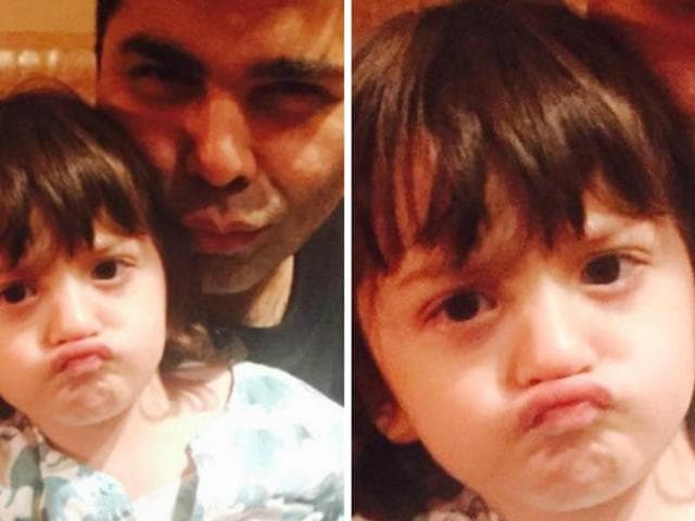 Little AbRam Khan with Karan Johar. Our birthday boy sure knows how to pout. Little AbRam Khan with Karan Johar. Our birthday boy sure knows how to pout.