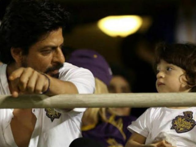 Shah Rukh Khan and AbRam share a moment between cheering for the actor’s IPL team, Kolkata Knight Riders. 
