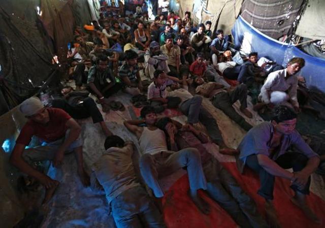 After dark, the cinema hall becomes a night shelter providing comfort in the scorching heat. (Reuters) After dark, the cinema hall becomes a night shelter providing comfort in the scorching heat. (Reuters)