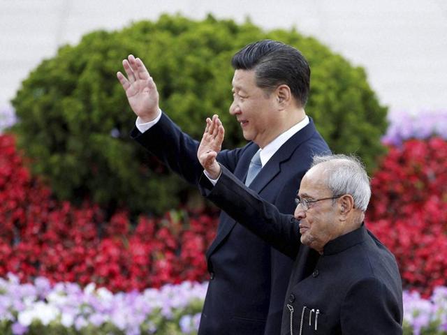 President Pranab Mukherjee and Chinese President Xi Jinping wave during a welcome ceremony outside the Great Hall of the People in Beijing. (AP) President Pranab Mukherjee and Chinese President Xi Jinping wave during a welcome ceremony outside the Great Hall of the People in Beijing. (AP)