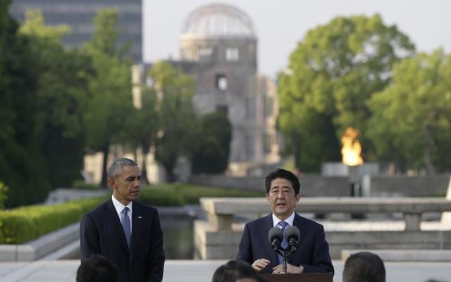 Japanese Prime Minister Shinzo Abe, right, delivers a speech next to US President Barack Obama at Hiroshima Peace Memorial Park in Hiroshima, western Japan. (AP) Japanese Prime Minister Shinzo Abe, right, delivers a speech next to US President Barack Obama at Hiroshima Peace Memorial Park in Hiroshima, western Japan. (AP)