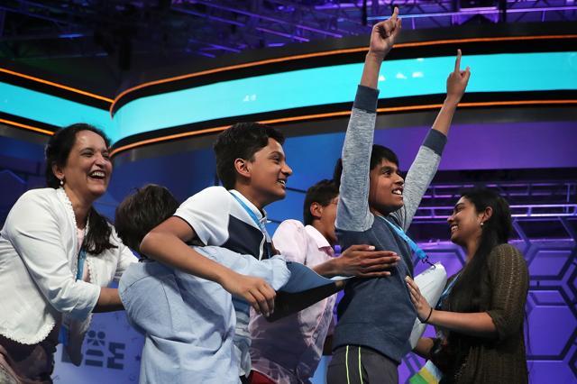 Spellers Nihar Saireddy Janga (second right) of Austin, Texas and Jairam Jagadeesh Hathwar (second left) of Painted Post, New York celebrate with family members after the finals of the 2016 Scripps National Spelling Bee on Thursday. (AFP) Spellers Nihar Saireddy Janga (second right) of Austin, Texas and Jairam Jagadeesh Hathwar (second left) of Painted Post, New York celebrate with family members after the finals of the 2016 Scripps National Spelling Bee on Thursday. (AFP)
