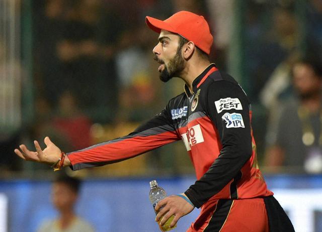Virat Kohli gestures at the umpires after having completed a catch to dismiss Eklavya Dwivedi during the 1st qualifier IPL against Gujarat Lions at Chinnaswamy Stadium . (PTI) Virat Kohli gestures at the umpires after having completed a catch to dismiss Eklavya Dwivedi during the 1st qualifier IPL against Gujarat Lions at Chinnaswamy Stadium . (PTI)