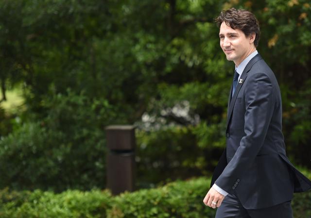 Canadian Prime Minister Justin Trudeau arrives at Ise-Jingu Shrine in the city of Ise in Mie prefecture, on May 26, 2016, on the first day of the G7 leaders summit. (AFP Photo)