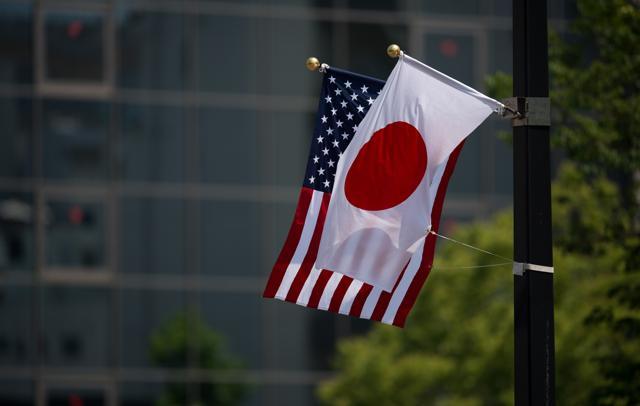 A Japanese and a US flag are seen next to the Hiroshima Peace Memorial in Hiroshima. (AFP) A Japanese and a US flag are seen next to the Hiroshima Peace Memorial in Hiroshima. (AFP)