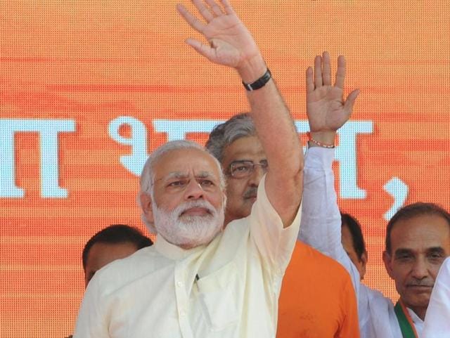 Prime Minister Narendra Modi waves towards the crowd at a rally in Saharanpur.(Ashok Dutta/HT Photo) Prime Minister Narendra Modi waves towards the crowd at a rally in Saharanpur.(Ashok Dutta/HT Photo)