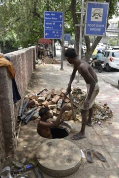 PWD has started the process of desilting the drains on Ring Road near Savitri Flyover. PWD has started the process of desilting the drains on Ring Road near Savitri Flyover.