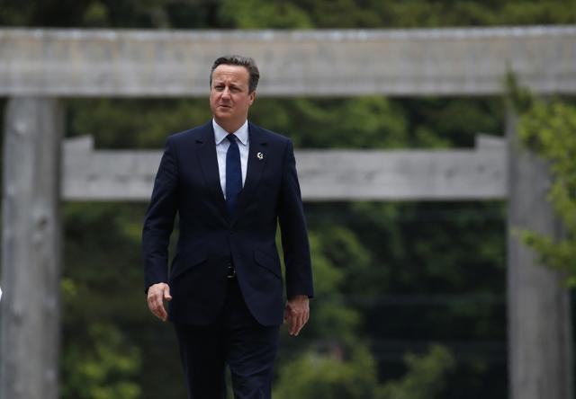 “PM ignores bombshell stats: As another 330,000 migrants prove we cannot control our own borders, Cameron responds ‘La-la la-la la..’“, The Sun headline on Friday said. (AP file photo) “PM ignores bombshell stats: As another 330,000 migrants prove we cannot control our own borders, Cameron responds ‘La-la la-la la..’“, The Sun headline on Friday said. (AP file photo)