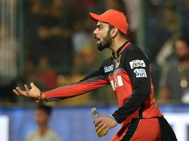 Royal Challengers Bangalore's Virat Kohli showing his hand after taking the catch of Eklavya Dwivedi during the 1st qualifier IPL 2016 match against Gujarat Lions in Bengaluru. (PTI) Royal Challengers Bangalore's Virat Kohli showing his hand after taking the catch of Eklavya Dwivedi during the 1st qualifier IPL 2016 match against Gujarat Lions in Bengaluru. (PTI)