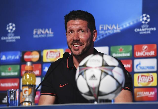 Atletico Madrid's head coach Diego Simeone smiles during a press conference at the San Siro stadium in Milan, Italy. (AP Photo) Atletico Madrid's head coach Diego Simeone smiles during a press conference at the San Siro stadium in Milan, Italy. (AP Photo)