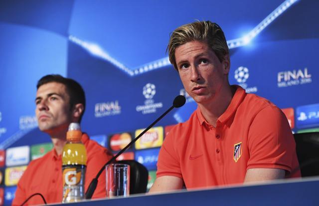 Atletico Madrid players Fernando Torres (R) and Gabi attend a press conference at the San Siro stadium in Milan, Italy. (AP Photo) Atletico Madrid players Fernando Torres (R) and Gabi attend a press conference at the San Siro stadium in Milan, Italy. (AP Photo)