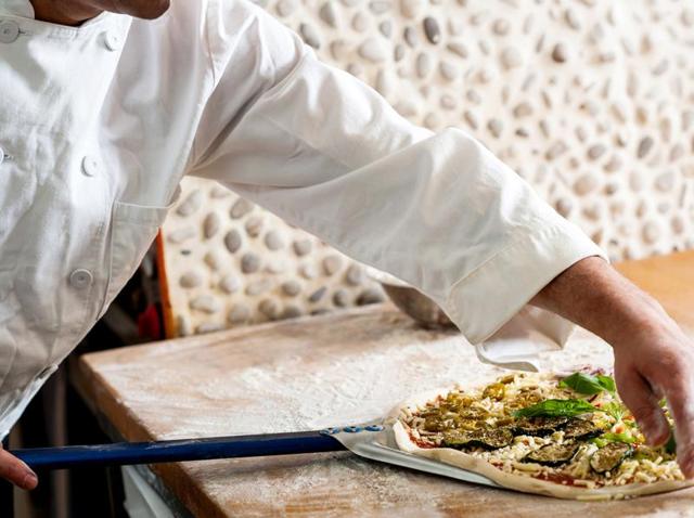 A pizza baker was acquitted on criminal charges of failing to pay child support after a judge ruled that he had done his best during difficult times to provide 400 Euros worth of pizzas. (Shutterstock) A pizza baker was acquitted on criminal charges of failing to pay child support after a judge ruled that he had done his best during difficult times to provide 400 Euros worth of pizzas. (Shutterstock)