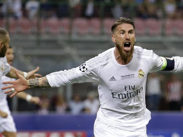 Real Madrid's Sergio Ramos celebrates after scoring his side's first goal during the Champions League final football match between Real Madrid and Atletico Madrid at the San Siro stadium in Milan, Italy. (AP Photo) Real Madrid's Sergio Ramos celebrates after scoring his side's first goal during the Champions League final football match between Real Madrid and Atletico Madrid at the San Siro stadium in Milan, Italy. (AP Photo)
