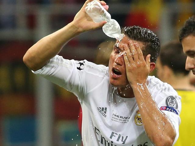 Cristiano Ronaldo pours water on his face before the Uefa Champions League final heads to extra time. (Reuters Photo) Cristiano Ronaldo pours water on his face before the Uefa Champions League final heads to extra time. (Reuters Photo)
