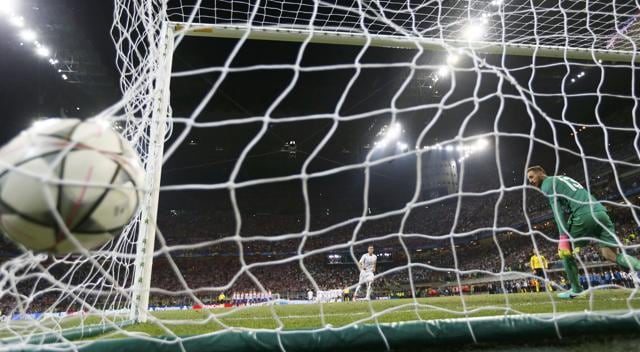 Real Madrid's Lucas Vazquez scores a goal during the penalty shoot out. (Reuters Photo) Real Madrid's Lucas Vazquez scores a goal during the penalty shoot out. (Reuters Photo)