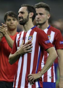 Atletico's Juanfran Torres reacts after missing a penalty during the Champions League final football match between Real Madrid and Atletico Madrid at the San Siro stadium in Milan, Italy. (AP Photo) Atletico's Juanfran Torres reacts after missing a penalty during the Champions League final football match between Real Madrid and Atletico Madrid at the San Siro stadium in Milan, Italy. (AP Photo)