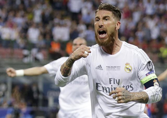Real Madrid's Sergio Ramos celebrates after scoring his side's first goal during the Champions League final football match between Real Madrid and Atletico Madrid at the San Siro stadium in Milan. (AP Photo) Real Madrid's Sergio Ramos celebrates after scoring his side's first goal during the Champions League final football match between Real Madrid and Atletico Madrid at the San Siro stadium in Milan. (AP Photo)