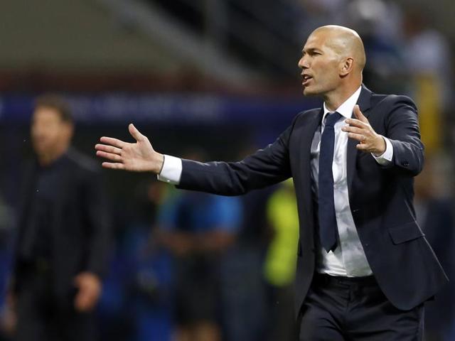 Real Madrid's head coach Zinedine Zidane gestures during the Champions League final football match between Real Madrid and Atletico Madrid. (AP Photo)