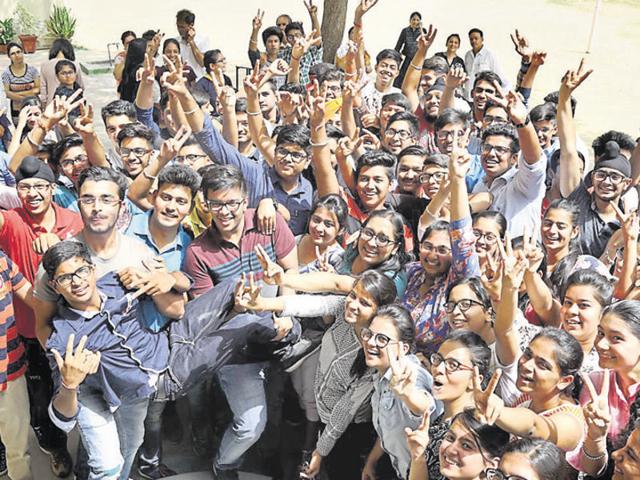 Students of Innocent Hearts Public School, Jalandhar, celebrating their success in Jalandhar on Saturday. (Pardeep Pandit/HT) Students of Innocent Hearts Public School, Jalandhar, celebrating their success in Jalandhar on Saturday. (Pardeep Pandit/HT)