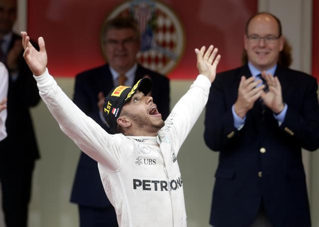 Mercedes driver Lewis Hamilton (C) with Red Bull’s Daniel Ricciardo (L) and Sahara Force India’s Sergio Perez after the race. (REUTERS) Mercedes driver Lewis Hamilton (C) with Red Bull’s Daniel Ricciardo (L) and Sahara Force India’s Sergio Perez after the race. (REUTERS)