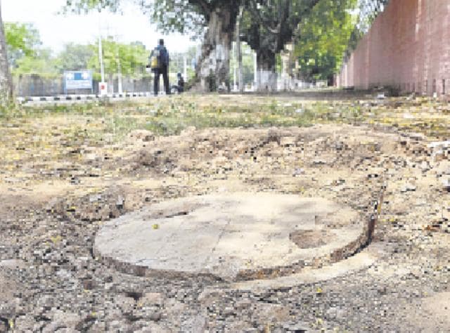 The manhole near Behlana village that was the scene of Saturday’s tragedy. (HT Photo) The manhole near Behlana village that was the scene of Saturday’s tragedy. (HT Photo)