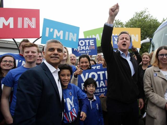 Britain's Prime Minister David Cameron (R) makes a joint appearance with the Mayor of London Sadiq Khan (C) as they launch the 'Britain Stronger In Europe' guarantee card in west London on Monday ahead of the EU referendum in Britain on June 23. (AFP) Britain's Prime Minister David Cameron (R) makes a joint appearance with the Mayor of London Sadiq Khan (C) as they launch the 'Britain Stronger In Europe' guarantee card in west London on Monday ahead of the EU referendum in Britain on June 23. (AFP)