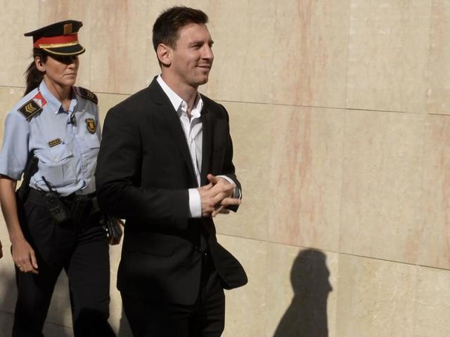 (FILES) This file photo taken on September 27, 2013 shows Barcelona football star Lionel Messi arriving to the courhouse in the coastal town of Gava near Barcelona on September 27, 2013 to face judges on tax evasion charges. (AFP) (FILES) This file photo taken on September 27, 2013 shows Barcelona football star Lionel Messi arriving to the courhouse in the coastal town of Gava near Barcelona on September 27, 2013 to face judges on tax evasion charges. (AFP)