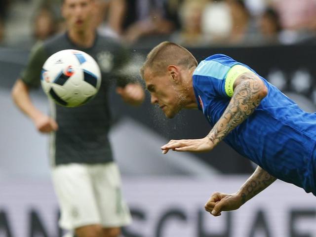 Slovakia’s Martin Skrtel challenges for the ball during a friendly soccer match between Germany and Slovakia in LiverpooAugsburg, Germany on Sunday. (AP) Slovakia’s Martin Skrtel challenges for the ball during a friendly soccer match between Germany and Slovakia in LiverpooAugsburg, Germany on Sunday. (AP)