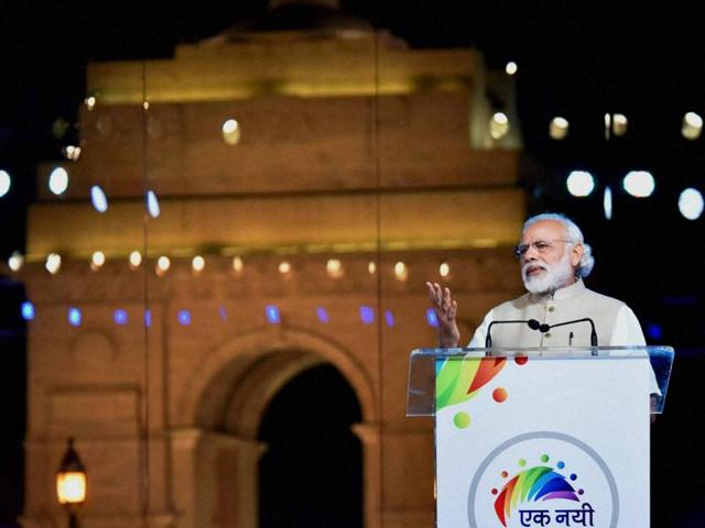Prime Minister Narendra Modi addressing people at the Ek Nayi Subah event that marked two years of NDA, at India Gate in New Delhi on May 28.(AFP Photo)