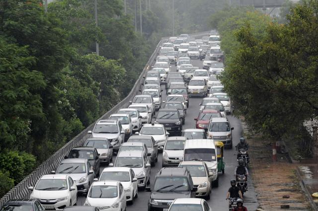 Traffic seems to be slow after the early rain in Noida. (Photo by Sunil Ghosh / Hindustan Times) Traffic seems to be slow after the early rain in Noida. (Photo by Sunil Ghosh / Hindustan Times)