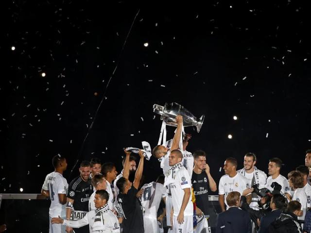 Real Madrid defeated local rivals Atletico Madrid 5-3 on penalties to win their 11th Champions League trophy in San Siro, Milan on Saturday. (Reuters Photo)