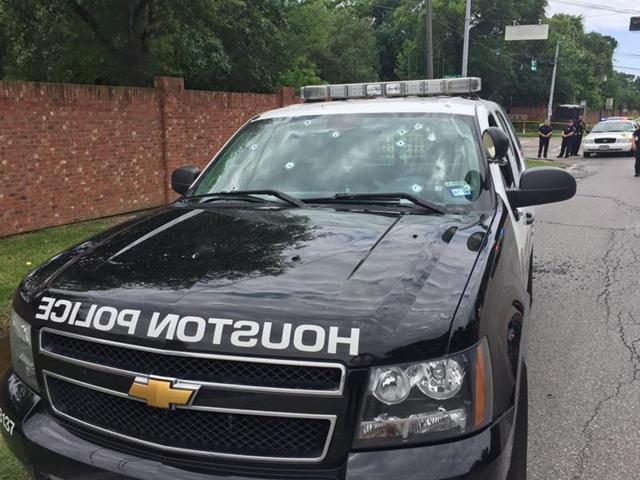 A Houston Police Department patrol car with bullet holes in its windshield in Houston, Texas, US, after a shooting incident that left two people dead and another six wounded. (REUTERS) A Houston Police Department patrol car with bullet holes in its windshield in Houston, Texas, US, after a shooting incident that left two people dead and another six wounded. (REUTERS)